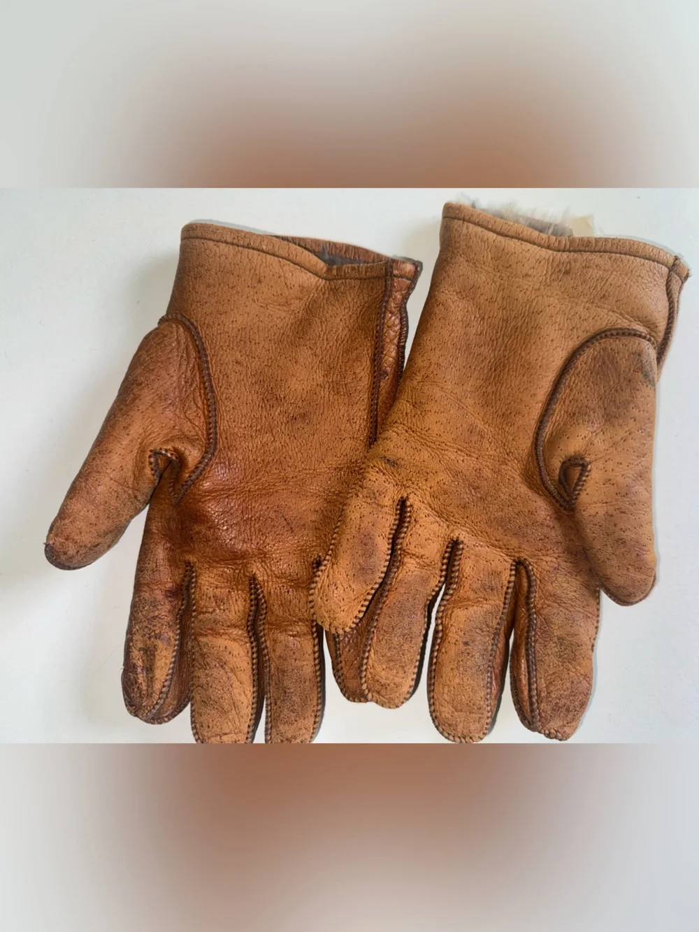 Brown Leather gloves with rabbit fur lining.